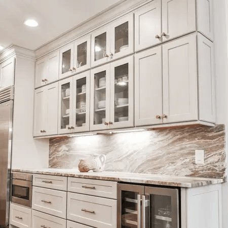 Rustic kitchen with wood and white cabinets